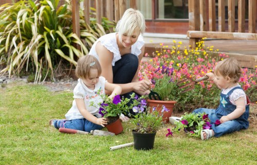 Professional lawn care equipment in use